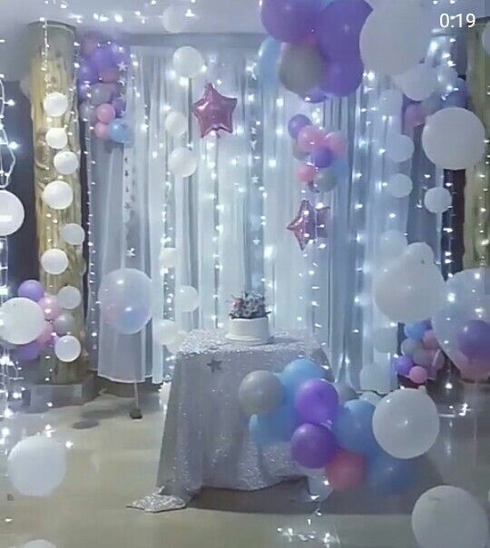 Fabric and light decor for birthday party at home 